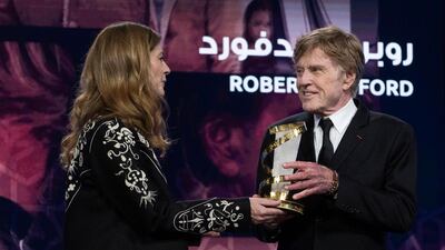 Robert Redford receives a career tribute award from French actress Chiara Mastroianni during the 18th annual Marrakech International Film Festival, in Marrakech. EPA