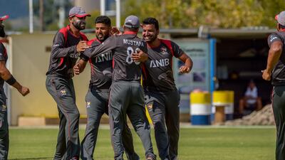 UAE fast bowler Mohammed Naveed, centre, bowled splendidly against Oman on Monday. Courtesy of Johan Jooste