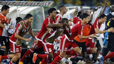 Equatorial Guinea players celebrate after winning their Africa Cup of Nations match against Gabon on Sunday to reach the quarter-finals. Amr Abdallah Dalsh / Reuters / January 25, 2015