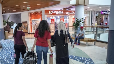 Shoppers will be seeking discount deals at malls across Abu Dhabi. Victor Besa/The National