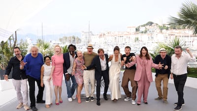 The cast and crew, including Dean and fellow actors Woody Harrelson and Harris Dickinson, at the festival in the South of France. AP