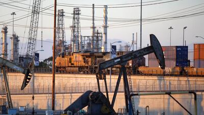 Occidental Petroleum said a political dispute in the Gulf was complicating plans to sell to a single investor group. David McNew / Reuters