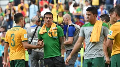 Australia defender Jason Davidson, left, shakes hands with forward Tim Cahill after the Group B match against Spain at the Baixada Arena in Curitiba during the 2014 Fifa World Cup on June 23, 2014. William West / AFP