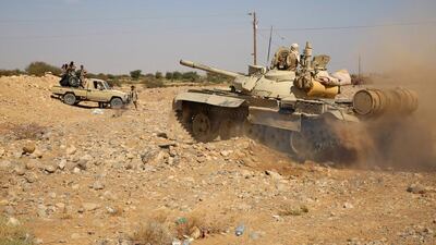 Yemeni tribesmen supporting forces loyal to president Abdrabu Mansur Hadi hold a position in the area of Sirwah, west of Marib city, on December 18, 2015. Abdullah Al Qadry/AFP Photo