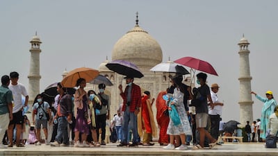 Tourists at the Taj Mahal in India. In OECD countries in the Asia Pacific region, tourist arrivals were at least 40 per cent lower in July 2022 than in July 2019. AFP