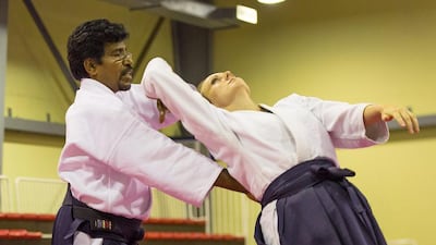 Sugumar John Ratnam, known to his pupils as Sensei John, leads a class at the Zanshinkan dojo (formerly the Aikido Club Dubai) in the Karate Centre Dubai. Clint McLean for The National