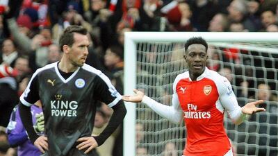 Arsenal's Danny Welbeck, right, reacts after scoring the winning goal during the English Premier League match between Arsenal and Leicester City in London, Britain, 14 February 2016. Arsenal won 2-1. At left Leicester's Christian Fuchs. EPA/GERRY PENNY