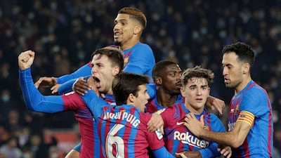FC Barcelona players celebrate their 3-2 lead during the Spanish LaLiga soccer match between FC Barcelona and Elche CF in Barcelona, Spain, 18 December 2021. EPA / Quique Garcia