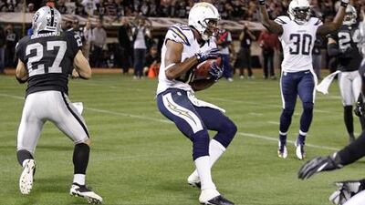 Malcom Floyd catches Philip Rivers' pass for San Diego against Oakland