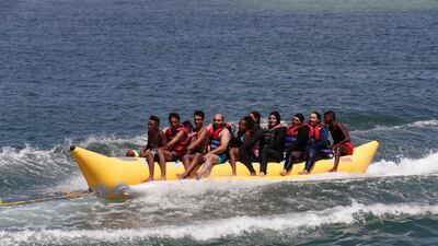 Young people on a boat trip in Marsa Matruh. EPA