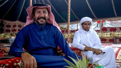 Abu Dhabi, United Arab Emirates, December 10, 2019. --Men of the Dawasir tribe from Saudi Arabia relax after a victory at the Al Dhafra Festival in Abu Dhabi, UAE. Victor Besa/The National Section: NA Reporter: Anna Zacharias
