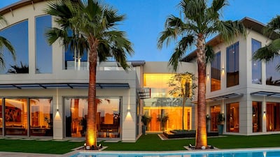 The exterior looks stunning both at dawn and dusk. It has a 20-metre infinity pool on one side and seating areas set under beach huts on the other. Courtesy Ocean View Real Estate