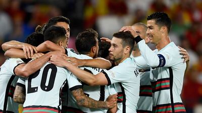 Portugal players celebrate after Ricardo Horta levelled at 1-1. AP