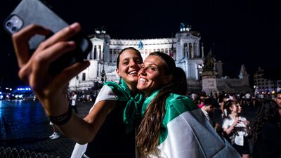 Italy fans celebrate at Piazza Venezia, Rome.