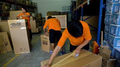 Some shipping companies are busier than usual due to expatriate families leaving Dubai during summer. Nicole Hill / The National