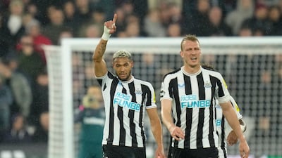 Newcastle's Joelinton, left, celebrates after scoring. AP