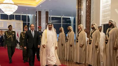 Sheikh Mohamed bin Zayed, Crown Prince of Abu Dhabi and Deputy Supreme Commander of the Armed Forces walks with Abdel Fattah El Sisi, President of Egypt, at the Presidential Airport. Hamad Al Kaabi / Ministry of Presidential Affairs