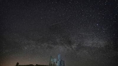 Stars over Dunstanburgh Castle in the early hours of the morning, between the villages of Craster and Embleton, in Northumberland, England. AP Photo