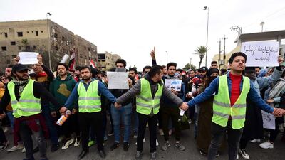 Iraqi university students chant slogans during a strike and protests in central Baghdad, Iraq. EPA