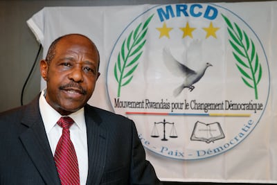 Paul Rusesabagina speaks to reporters in Brussels in June 2019 while serving as chairman of the Rwandan Movement for Democratic Change. AFP