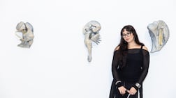 Nour Elbery with her installation Set Dressing for an Afterimage for the Mutable Devotions exhibition. Photo: NYUAD