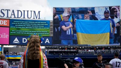 Yulia Holiyat, 11, of Brooklyn, sings the Ukrainian national anthem in honour of the country's struggle in their war with Russia before the New York Yankees opening day baseball game against the Boston Red Sox. AP