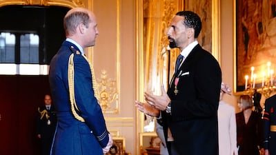 Former soccer player Rio Ferdinand is made an Officer of the Order of the British Empire by Prince William at Windsor Castle on Tuesday. PA