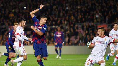Luis Suarez scores his incredible backheeled goal. Getty