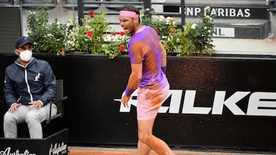 Rafael Nadal after tripping over due to a faulty line on the court during his Italian Open final win over Novak Djokovic in Rome, on Sunday, May 16. AFP