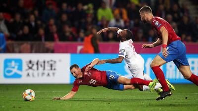 Czech Republic's Jan Boril (left) and England's Raheem Sterling battle for the ball during the UEFA Euro 2020 qualifying, Group A match at Sinobo Stadium, Prague. PA Photo.