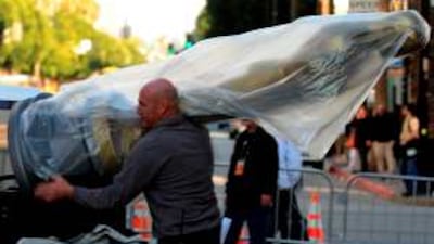 Body bag? An Oscar statue on the red carpet in Hollywood.