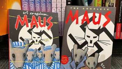Two books in the graphic novel series 'Maus' by American cartoonist Art Spiegelman. 'Maus' was recently banned in Tennessee. Reuters