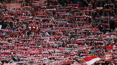 Bayern Munich's supporters cheer during Tuesday night's Champions League draw against Manchester United at Old Trafford. Stefan Wermuth / Reuters / April 1, 2014