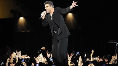 British pop legend George Michael performs at Zayed Sports City Stadium in Abu Dhabi. AP Photo / Carl Abrams