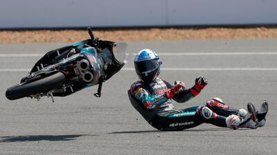 Britain's rider John Mcphee of the Petronas Sprinta Racing Team crashes during Thailand's Moto3 at the Chang International Circuit in Thailand, Sunday, October 6. AP