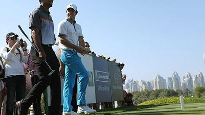There was a buzz at the start of the day when Tiger Woods and Rory McIlroy walked out together to play at the Omega Dubai Desert Classic. Caren Firouz / Reuters