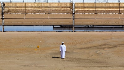 Yousif Al Ali, the Shams 1 general manager, in front of the plant's curved mirrors.