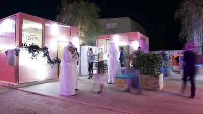 Visitors peruse an art exhibition at Warehouse421. Vidhyaa for the National