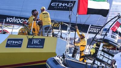 Emirati Adil Khalid holds up the UAE flag after Abu Dhabi Ocean Racing win the first leg of the 2014/15 Volvo Ocean Race on Wednesday in Cape Town, South Africa. Charlie Shoemaker / Volvo Ocean Race / Getty Images