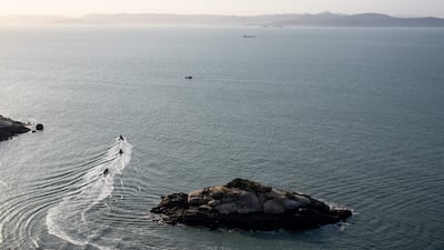 Boats from Taiwan's Amphibious Reconnaissance and Patrol Unit patrol the Matsu Islands, with China's Fujian province in the background. AFP