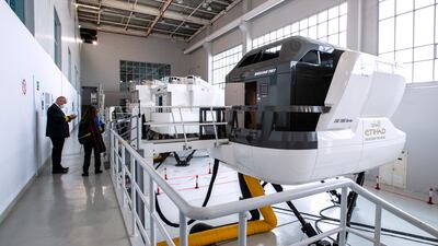 A Boeing 787 flight simulator. Victor Besa / The National