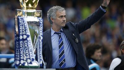 Chelsea manager Jose Mourinho acknowledges supporters on Sunday during the club's Premier League trophy presentation. Adrian Dennis / AFP / May 24, 2015