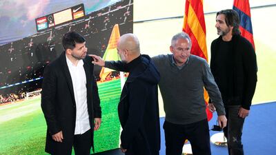 Sergio Aguero talks to Pep Guardiola and Txiki Begiristain. Reuters