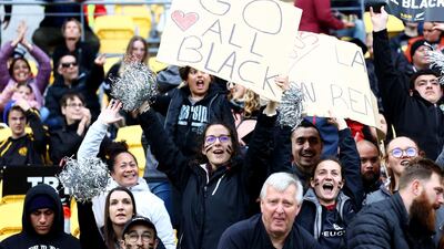All Blacks fans cheer on their team during the Bledisloe Cup match between the New Zealand and the Australia at Sky Stadium in Wellington. Getty Images