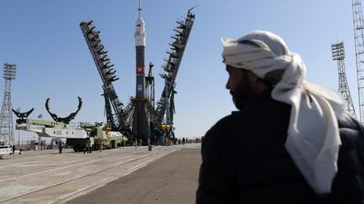An Emirati official looks on as the MS-15 spacecraft and the rocket carrying it is installed on the launch pad at the Baikonur Cosmodrome on Monday, ahead of the launch on Wednesday evening. Maxim Shipenkov / EPA