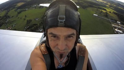 Mr Hadrava pilots his ultralight plane based on the US-design of aircraft called Mini-Max. David W Cerny / Reuters