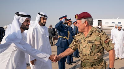 King Abdullah II, King of Jordan (R) greets Sheikh Mohamed bin Hamad bin Tahnoon Al Nahyan (L), prior to the UAE and Jordan joint military drill, Titled ‘Bonds of Strength’, at Al Hamra Camp. Seen with HH Sheikh Diab bin Tahnoon bin Mohamed Al Nahyan (2nd L). ( Mohamed Al Hammadi / Ministry of Presidential Affairs ) ---