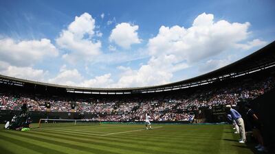 General View of Court 1 as Jo-Wilfried Tsonga of France plays against Jurgen Melzer of Austria in their first-round match on Tuesday on Day 2 of the 2014 WImbledon Championships. Tsonga won in five sets. Jan Kruger / Getty Images / June 24, 2014