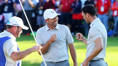 Sergio Garcia and Martin Kaymer of Europe react on the 15th green during afternoon fourball matches. Andrew Redington / Getty Images