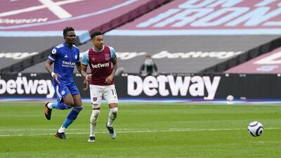 Jesse Lingard scores his, and West Ham's, second goal against Leicester. Reuters